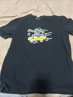 Uniqlo Black Short-Sleeve Tee with Yellow Skateboard Graphic